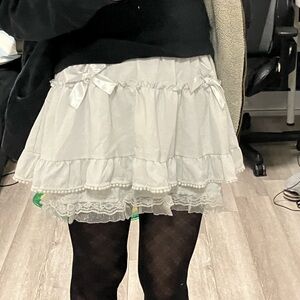 Two layered white ruffled mini skirt